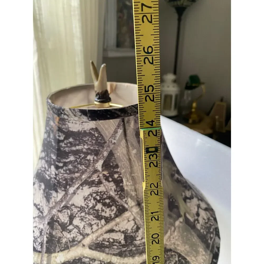 rustic table lamp featuring a base made of camo-patterned fabric lampshade